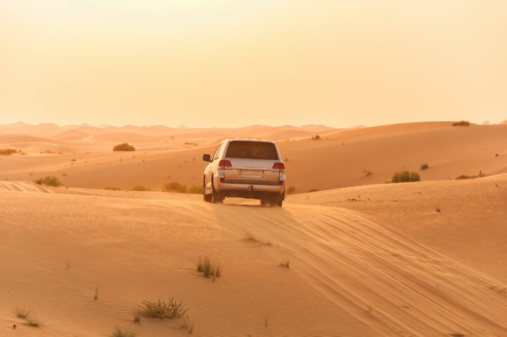 white suv on desert